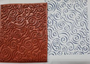 Gebruikt. Rubber stempel op looptape, swirls 1